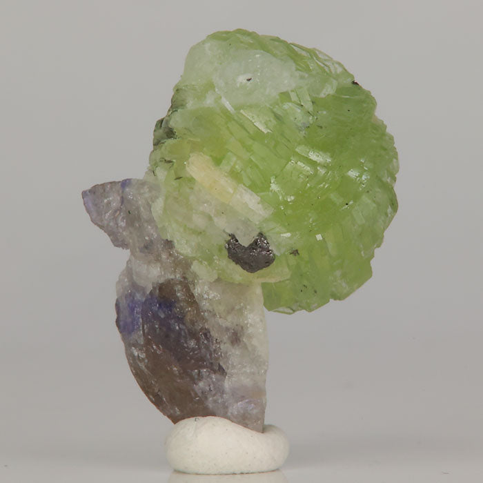 Prehnite cluster with tanzanite and diopside