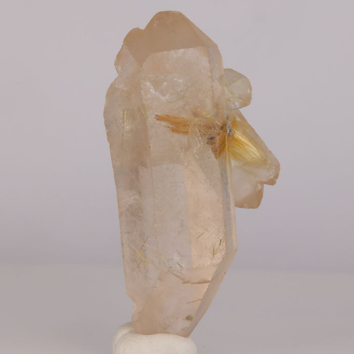 Rutilated quartz crystal specimen from brazil