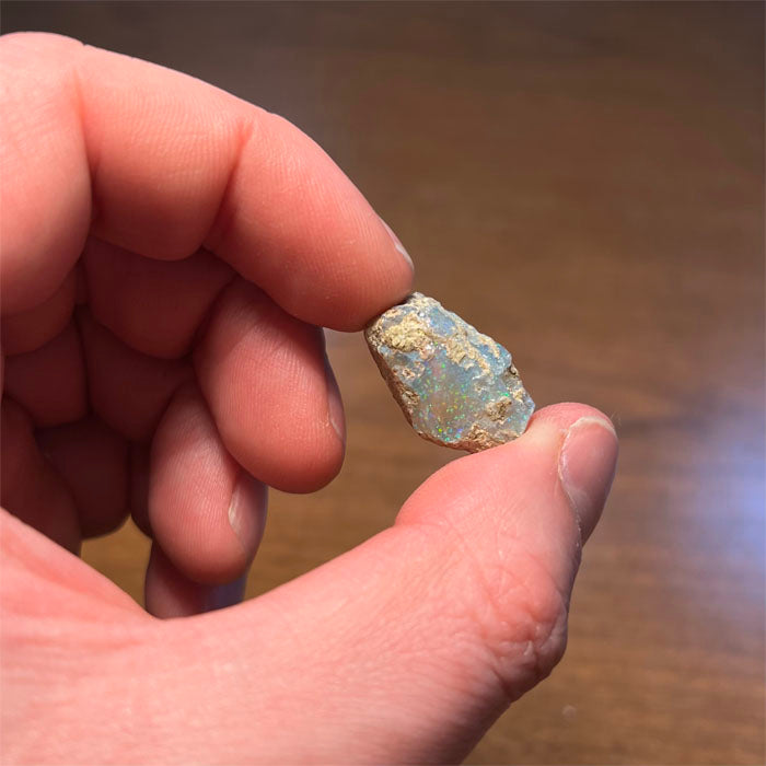 Welo Ethiopian opal rough in hand