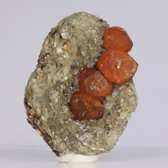 Orange spessartite garnet crystal specimen from Tanzania