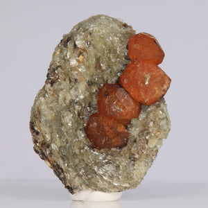 Orange spessartite garnet crystal specimen from Tanzania