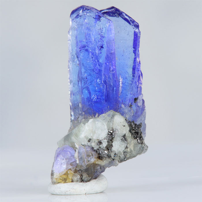 tanzanite mineral specimen on matrix host rock