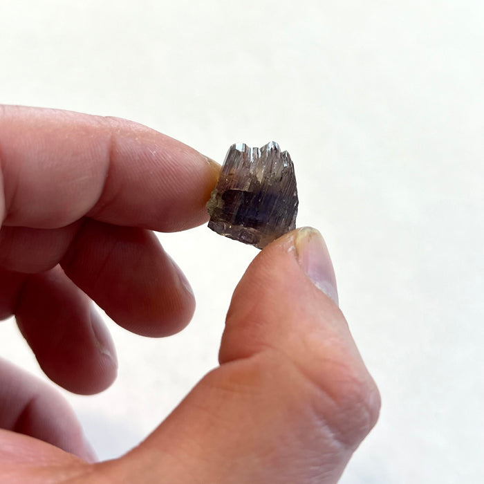 Pink Tanzanite Crystal in hand