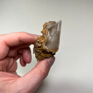 natural gypsum crystal with matrix and vertical striations