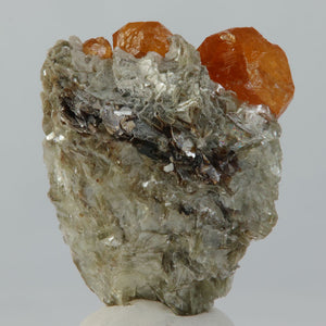 vivid orange spessartine garnet mineral specimen thumbnail size