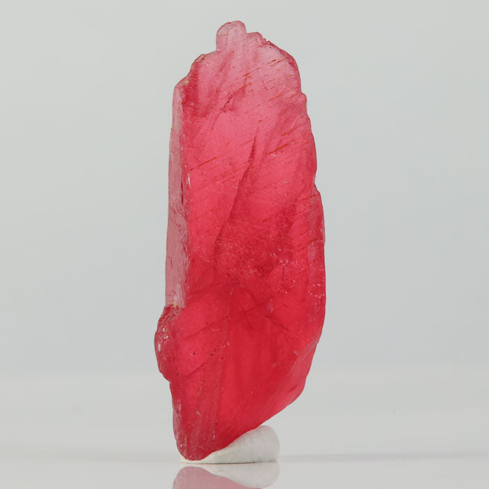 natural brazil rhodonite specimen with tall sculptural form