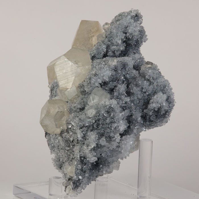 Sharp calcite crystals on sparkling druzy matrix