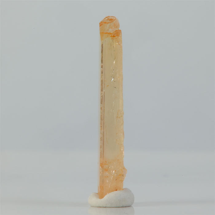 natural imperial topaz display specimen elongated transparent crystal