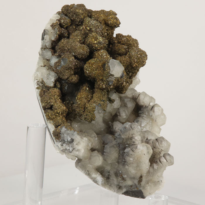 Metallic pyrite aggregates with translucent calcite crystals from China