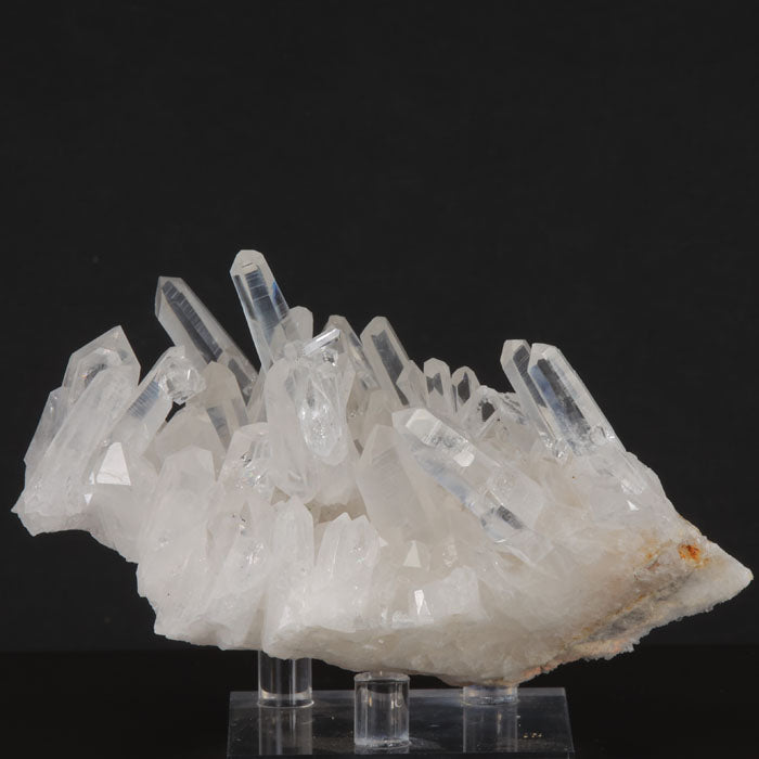 cluster of clear white terminated quartz crystals