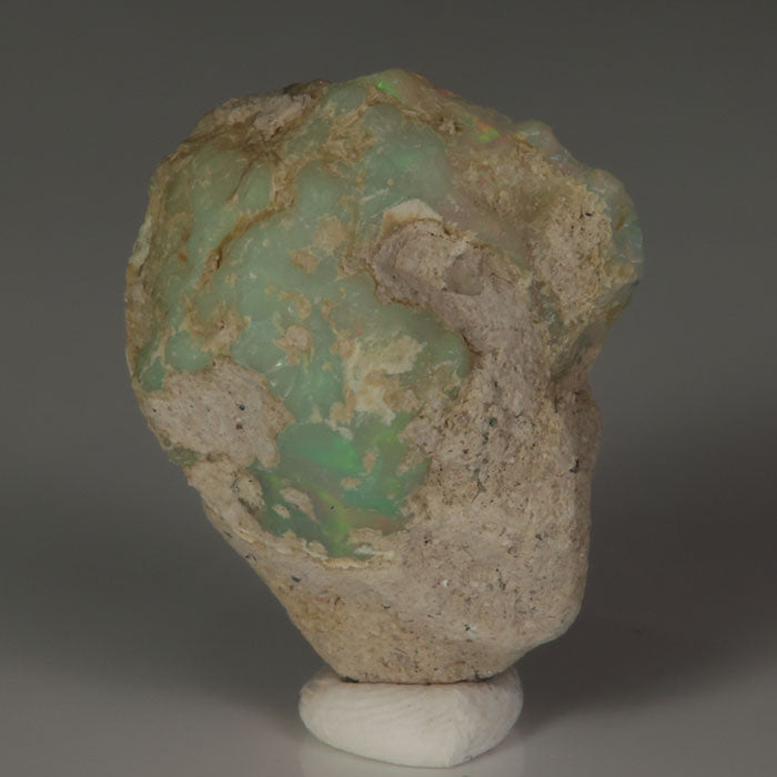 Ethiopian hydrophane opal rough with red, orange, yellow, and green fire