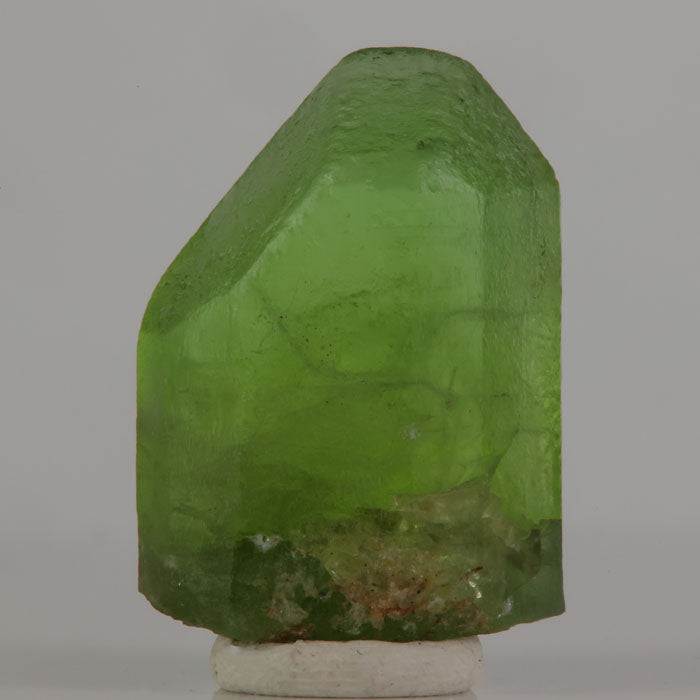 Collector peridot specimen with rich green color and natural termination