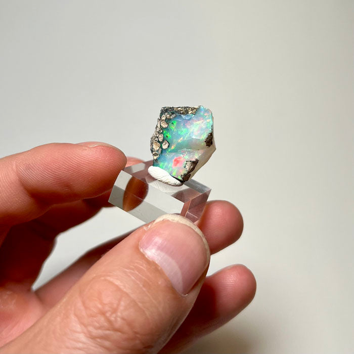 Ethiopian hydrophane opal rough with vivid green and red play-of-color