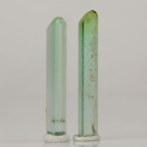 pair of light green tourmaline crystals from Congo elongated shape