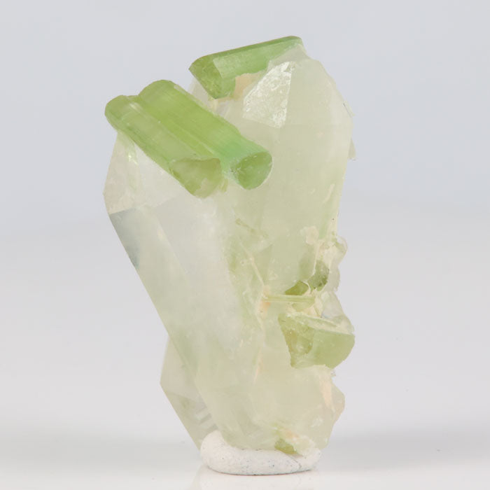 green tourmaline and quartz crystals