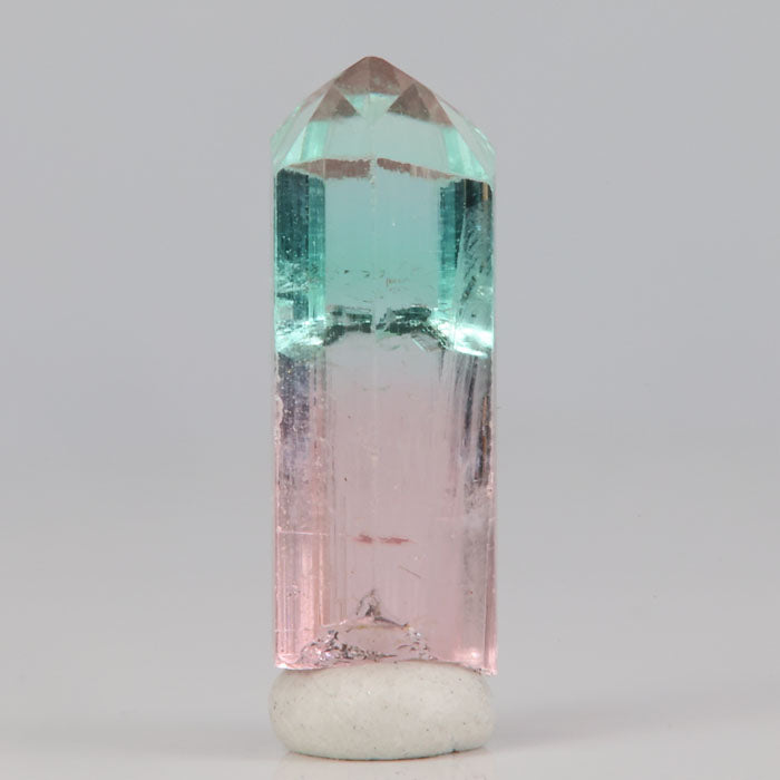 split pink and green tourmaline crystal raw