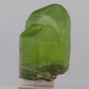 Green crystal on a white background