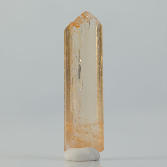 natural imperial topaz display specimen elongated transparent crystal