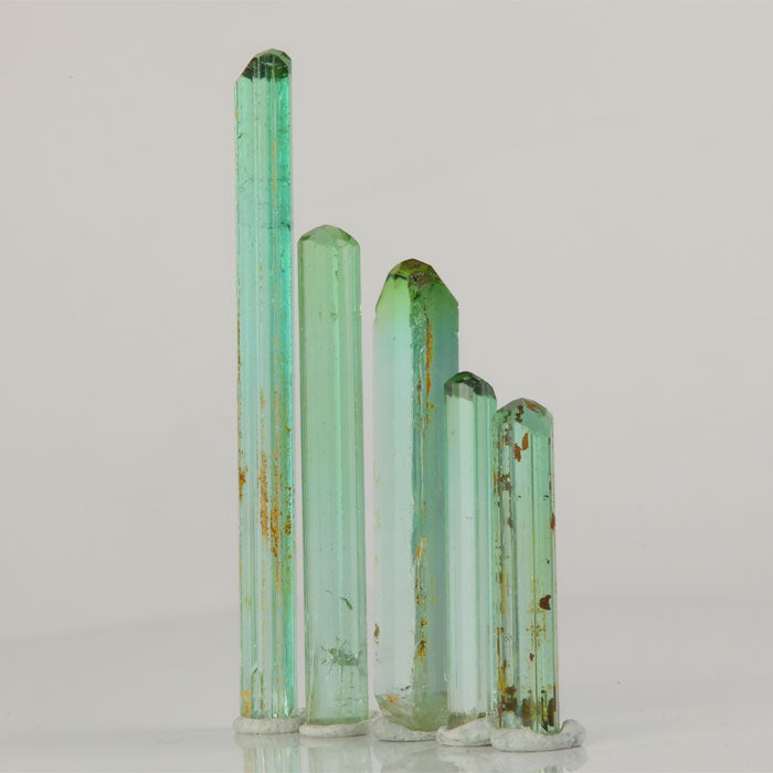five piece tourmaline crystal lot bright green slender crystals