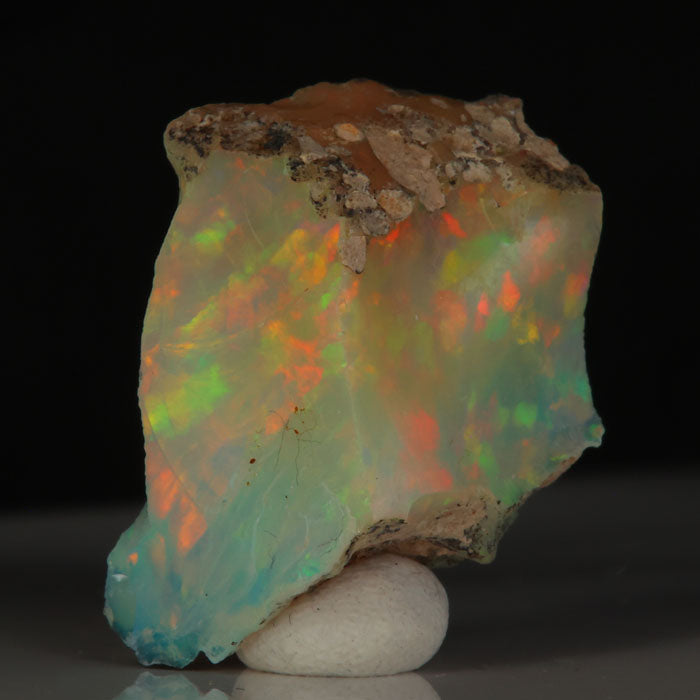 Ethiopian Welo opal rough with green orange red play of color