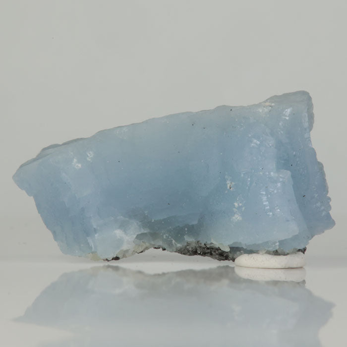 Fluorescent blue prehnite crystal from Tanzania under UV light