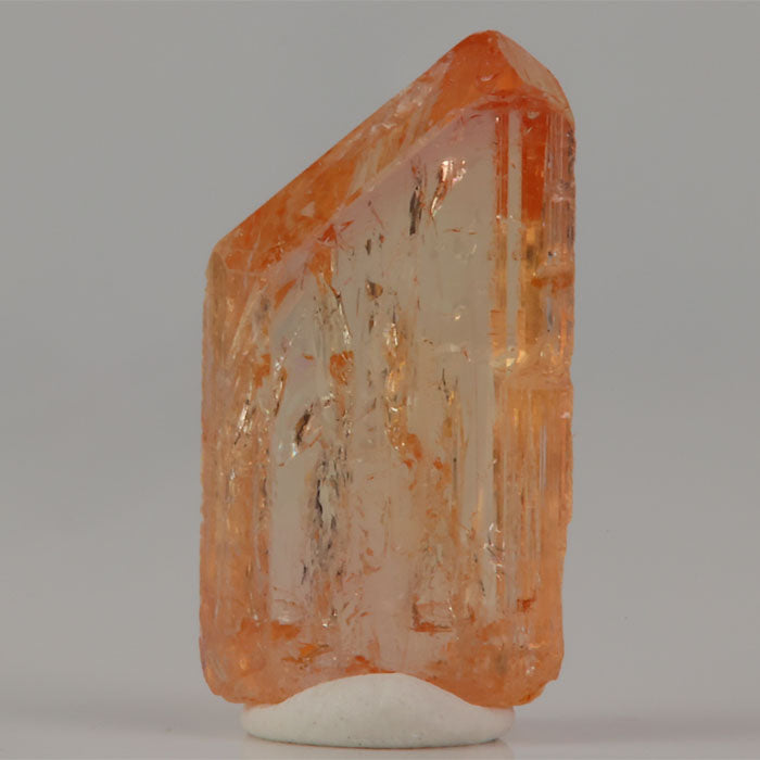 Orthorhombic topaz crystal with rich color and elongated structure