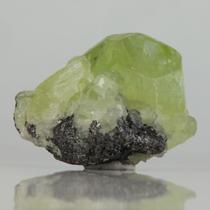Translucent green Diopside crystal cluster