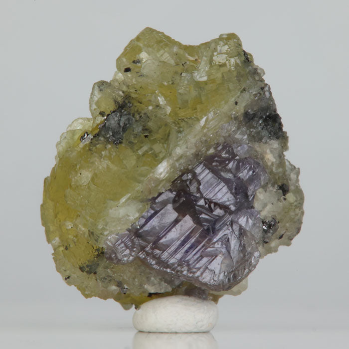 Green Prehnite associated with violet Tanzanite