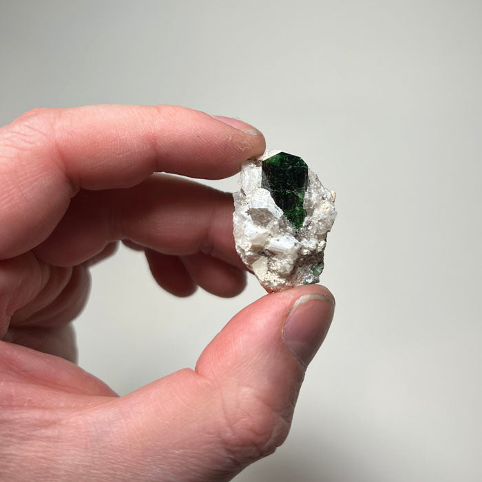 green tourmaline crystal on quartz matrix Landanai