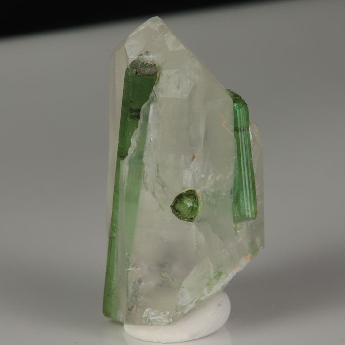 Transparent Quartz containing green Tourmaline crystals