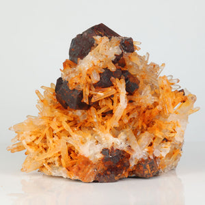 Oxidized pyrite crystals scattered across a quartz matrix