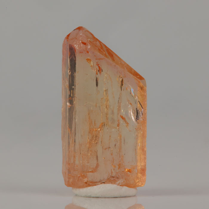 Imperial topaz crystal from Ouro Preto Brazil with golden orange color