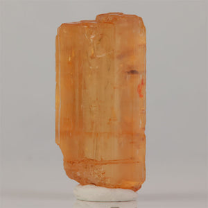 Imperial topaz crystal from Ouro Preto Brazil with golden orange color and large size