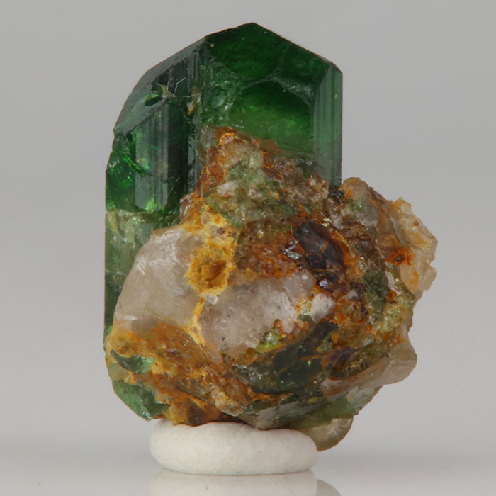 green tourmaline crystal with prismatic form