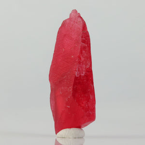 large pink rhodonite specimen from brazil elongated thumbnail mineral