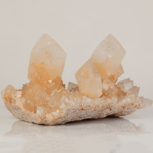 Natural peach colored calcite display specimen from China