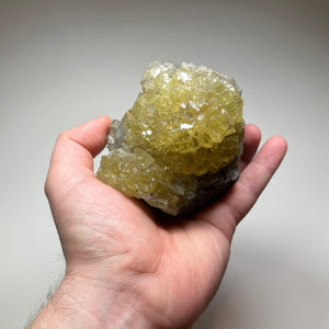 yellow green prehnite crystals on matrix specimen