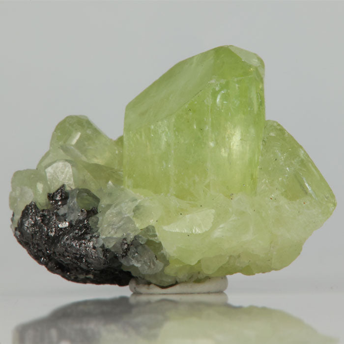 Green Diopside crystal on graphite matrix from Tanzania