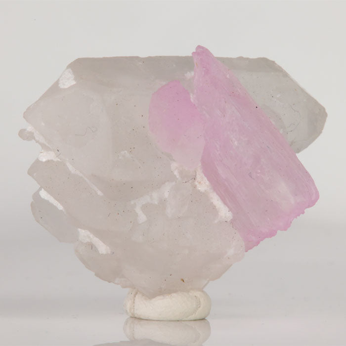 Reverse view of Afghan Kunzite specimen showing a broad pink crystal with fine parallel striations and pearly luster.