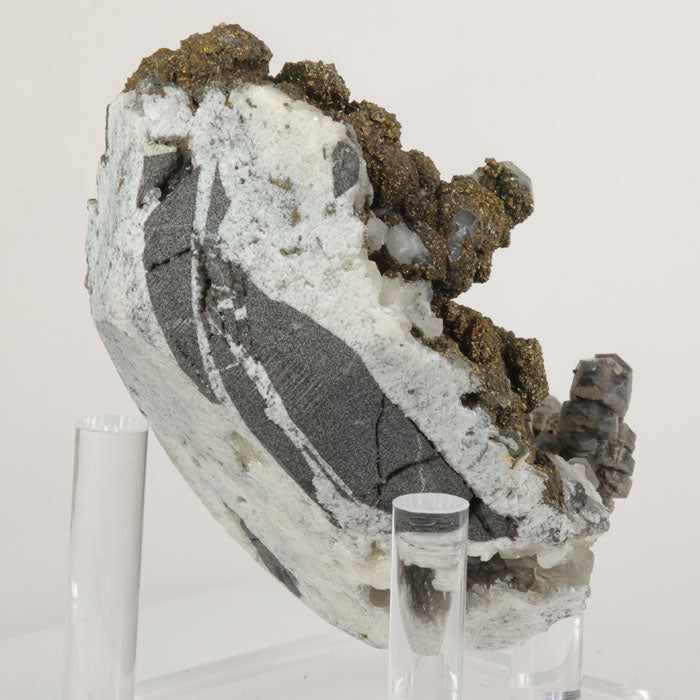 Collector mineral specimen featuring pyrite over calcite crystal growth