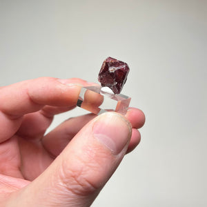 Natural zircon specimen showing equant crystal habit and internal reflections