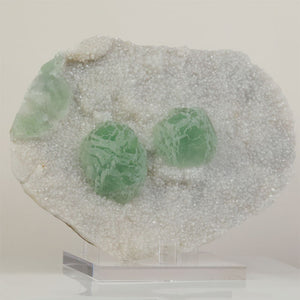 Mint green fluorite crystals on white druzy matrix from Jiangxi China
