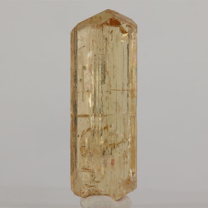 Scapolite crystal with translucent body and visible growth zoning