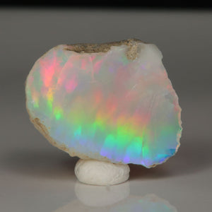 Natural opal rough with green, red, and orange flashes