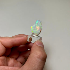 Natural Ethiopian opal displaying red, green, and orange fire