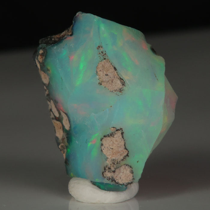 Ethiopian opal with green, pink, and orange flashes