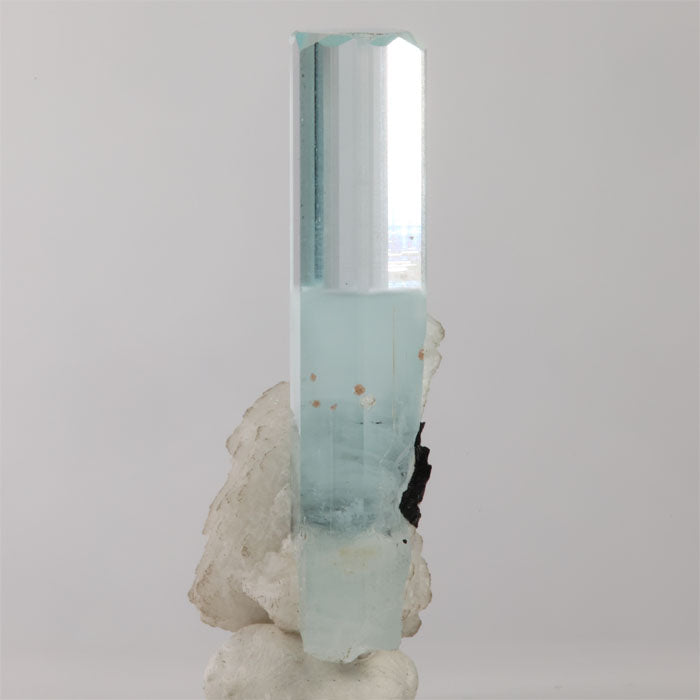 Shigar Mine aquamarine specimen weighing 16.25 grams with a tall prismatic crystal and natural matrix.