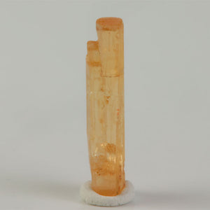 Champagne-colored Topaz crystal displaying natural termination