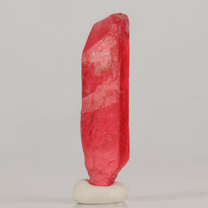 Natural rhodonite specimen with vivid color and vertical crystal habit