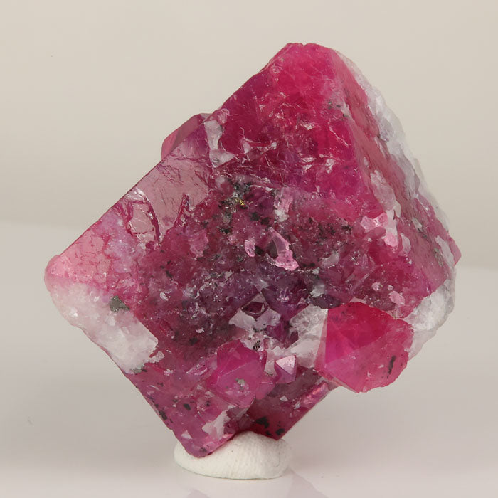 reddish pink spinel octahedron mineral specimen
